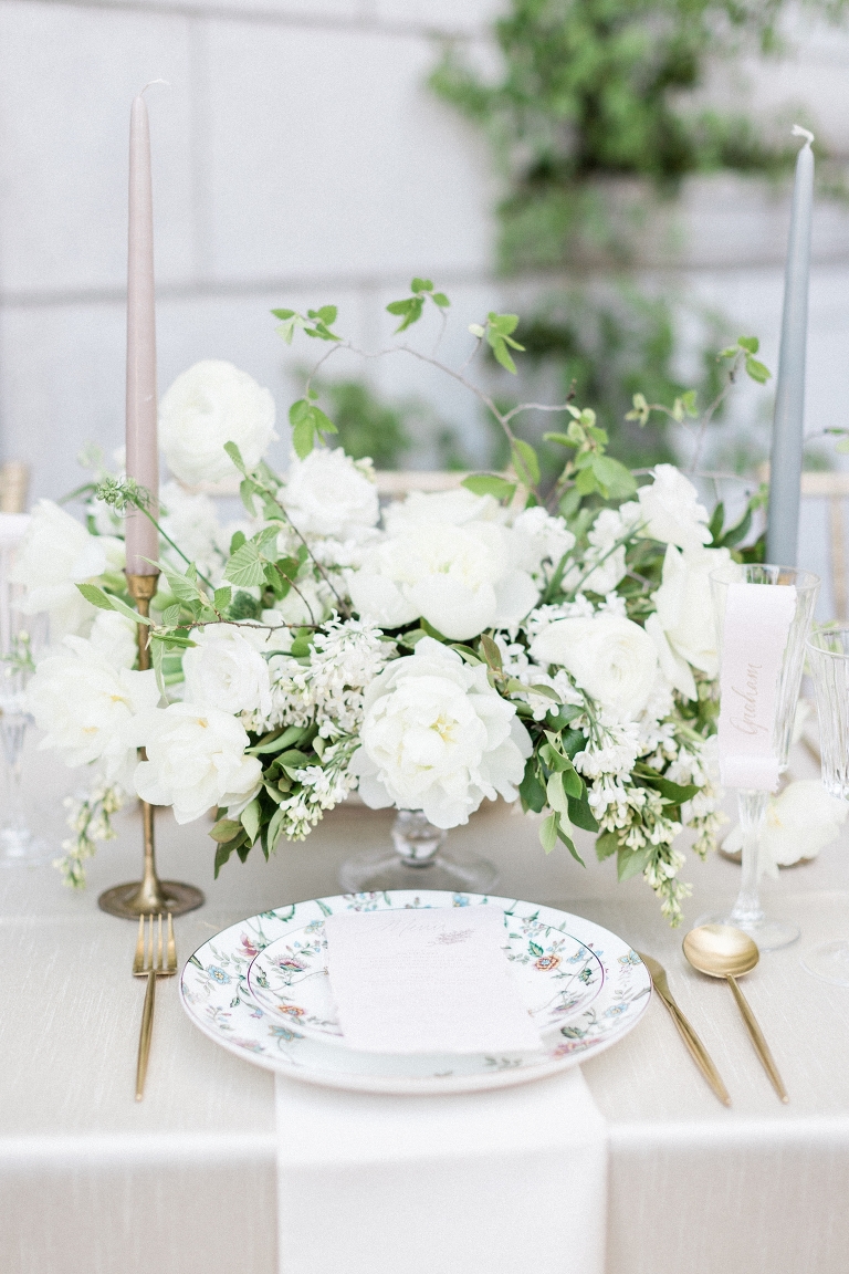 White wedding flowers by Bushel and a Peck Floral. Grand America wedding photo.